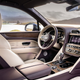 A photo of the front seat and dashboard in a Bentley Bentayga EWB